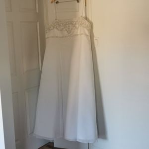 White beaded wedding dress.